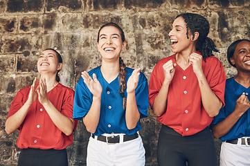 Image showing Happy woman, baseball and team in applause, celebration or winning cheer in sports game. Group of female athlete or players clapping in teamwork, motivation or support in unity or achievement success