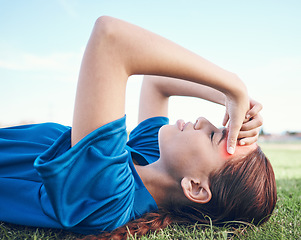 Image showing Sports, headache and woman on a baseball field with fatigue, burnout or health, crisis and mistake. Fitness, migraine and softball player on ground with pain, vertigo or stress, problem or accident