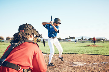 Image showing Bat, baseball and person swing at ball outdoor on a pitch for sports, performance and competition. Behind athlete or softball team ready for a game, training or exercise challenge at field or stadium