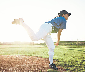 Image showing Baseball, pitching and sports person outdoor on a pitch for performance and competition. Professional athlete or softball player for a game, training or exercise challenge at field or stadium