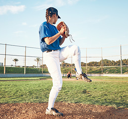 Image showing Sports person, pitching and baseball outdoor on pitch for performance and competition. Behind professional athlete or softball player for team game, training or exercise challenge at field or stadium