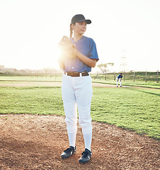 Image showing Baseball, pitcher and sports person outdoor on a pitch for performance and competition. Professional athlete or softball woman thinking of a game, training or exercise challenge at field or stadium