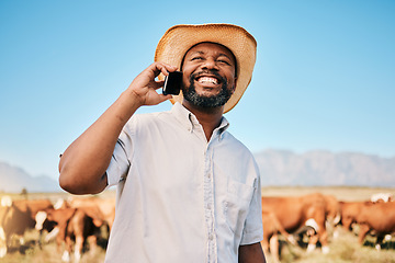 Image showing Happy black man, phone call and animals for communication, farming or networking in the countryside. African male person smile and talking on mobile smartphone for conversation or discussion on farm