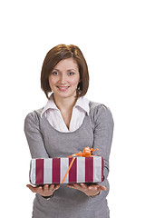 Image showing Woman offering a gift box