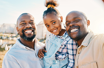 Image showing Farm, lgbtq and portrait of fathers with girl in countryside for holiday, adventure and family vacation. Travel, sustainable farming and African parents with kid for bonding, relax and fun in nature