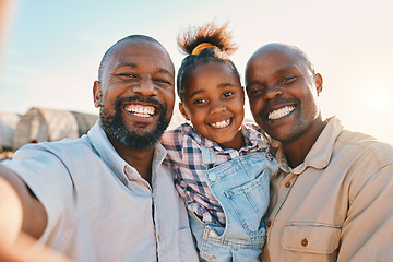 Image showing Agriculture, gay and selfie of parents with girl in countryside for holiday, adventure or family vacation. Travel, farm and portrait of lgbtq fathers with child for bonding, relax and fun in nature