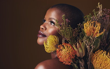 Image showing Thinking, flowers and black woman with skincare, dermatology and cosmetics on a brown studio background. Ideas, person and model with natural beauty, mockup space and wellness with plants and shine