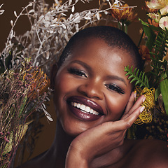 Image showing African woman, plants and makeup in studio portrait with beauty, wellness and natural glow by brown background. Girl, model and face with leaves, flowers and happy for cosmetics, shine or aesthetic