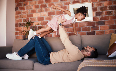 Image showing Sofa, airplane and dad playing child or daughter enjoy game as bonding for care together in a home or house. Fly, love and father with kid in living room, happy and smile on weekend for happiness