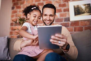 Image showing Dad, child and tablet for learning on sofa in family home or reading online, playing a game or technology for education. Father, kid and mobile app to teach or streaming cartoon and relax watching tv