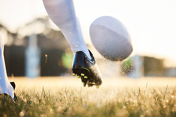 Image showing Rugby ball, feet kick and sport game with support, exercise and competition with athlete training. Field and target practice on grass with cardio, fitness and workout with shoe and boot closeup