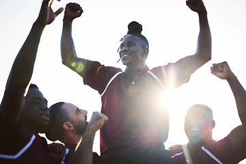 Image showing Rugby, team and celebration of champion in winning, achievement or victory in sports, tournament or game. Happy group of athletic, sporty men or players with fist pump in success, teamwork or fitness