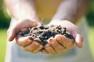 Image showing Gardening, soil in hands and palm of man in nature for agriculture, farming and planting flowers. Sustainability, environment and male person with earth, fertilizer and dirt on hand for earth day