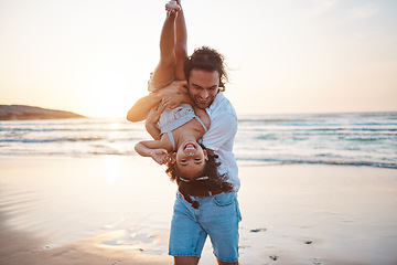 Image showing Beach, sunset and father play with girl on holiday, vacation and adventure. Happy family, adoption and child laughing with dad by ocean for bonding, healthy relationship and fun outdoors in summer