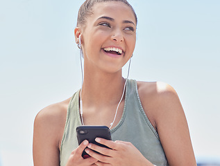 Image showing Thinking, fitness and a woman with a phone and music for exercise, training and an outdoor workout. Smile, running and a girl or athlete with a podcast and a mobile for a cardio idea or audio