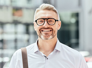 Image showing Mature business man, street and portrait with glasses, bag and happy for walk, travel or outdoor in metro. Entrepreneur, CEO or manager in city, traffic or sidewalk for excited smile on face in Milan