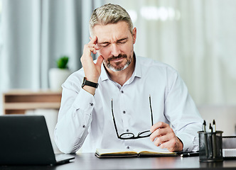 Image showing Stress, anxiety and mental health with a business man in the office, working on a laptop for his report deadline. Burnout, headache and tax with a corporate manager overwhelmed by a financial crisis