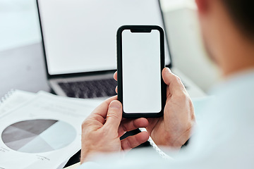 Image showing Mockup space, phone and hands of man with laptop in office for internet, connection and mobile app brand. Advertising, technology and business worker online on smartphone for social media with graph