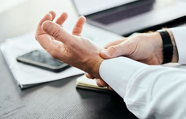 Image showing Business, wrist pain and hands of man in office holding for injury, inflammation and joint strain. Stress, medical emergency and closeup of worker with problem, crisis and carpal tunnel for writing