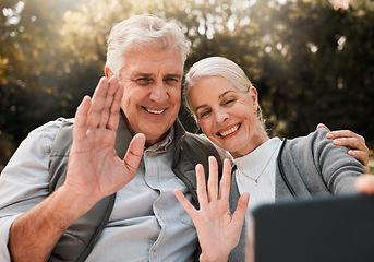 Image showing Senior couple, hiking and video call in nature, wave and smile outdoor with hello, sunshine and adventure. Elderly man, woman and webinar on social media, live streaming and excited for chat in woods