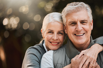 Image showing Love, portrait and senior couple hug at a park happy, free and enjoy travel, holiday or weekend. Face, smile and elderly woman embrace man in forest, bond and having fun on retirement trip together