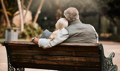 Image showing Park bench, back or relax couple hug, bond and cuddle together, connect and enjoy quality time, fresh air or outdoor nature break. Natural wellness, freedom or marriage people support, care and trust