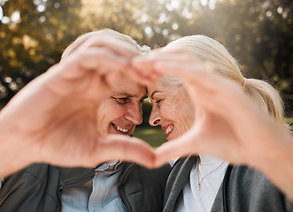 Image showing Love, park and senior happy couple with heart hands for retirement health, marriage bond and romantic date symbol. Support, emoji icon and outdoor man, old woman or people smile for nature wellness