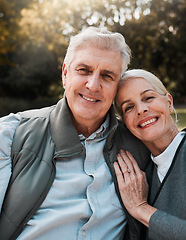 Image showing Smile, portrait and senior couple hug in a forest, love and bond in nature on a weekend trip together. Happy, face and romantic old woman embrace elderly male in woods, cheerful and enjoy retirement