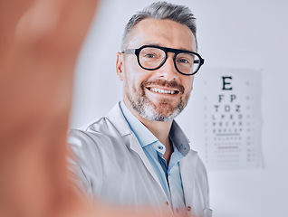 Image showing Selfie, glasses and eye exam with an optometrist man in his office for healthcare or vision improvement. Medical, portrait and eyewear with a doctor or optician in a clinic for assessment and testing