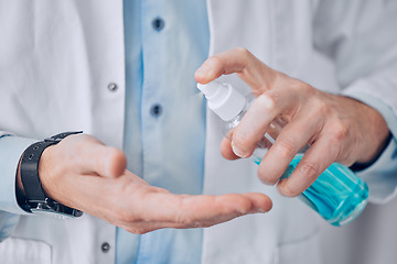 Image showing Closeup, hands and doctor, with sanitizer, man and protection from bacteria, disease and virus. Spray, person or medical professional for hygiene, wellness and healthcare with safety and disinfectant