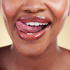 Image showing Woman, lips and tongue out, natural beauty and cosmetics, skin and closeup isolated on studio background. Smile, lipstick and makeup with skincare, shine and dermatology, lick and playful with fun