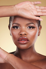 Image showing Beauty, face and a black woman with makeup in studio for skin care, glow and cosmetics. Portrait of african person or aesthetic model with facial shine, dermatology and wellness on a beige background