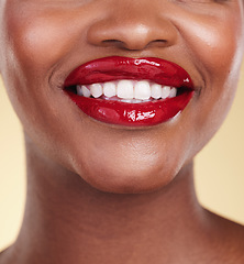 Image showing Red lipstick, woman with beauty and mouth, teeth and makeup and smile closeup isolated on studio background. Bold cosmetic product, lips and dental health, elegance and glamour with color and glow