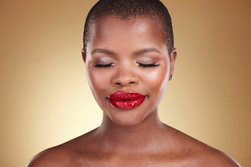 Image showing Red lipstick, makeup and a black woman with beauty in studio or skin care, glow and cosmetics. Face of an African person or model with facial shine, dermatology and wellness on a beige background