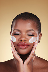 Image showing Face, cream and beauty of black woman in studio for self care, skincare or cosmetics. Headshot of african person or aesthetic model with facial moisturizer, dermatology and glow on a beige background