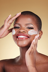 Image showing Skincare, portrait and face cream for black woman in studio happy, dermatology or cosmetic results on brown background. Beauty, smile and model with facial, sunscreen or collagen, mask or application