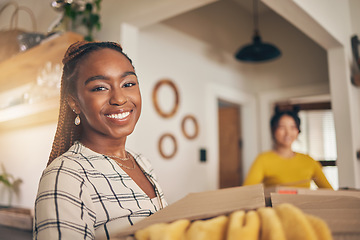 Image showing Black woman, portrait and new home with cardboard boxes for moving and property investment. Happy face, smile and couple of friends excited with package for real estate in a living room together