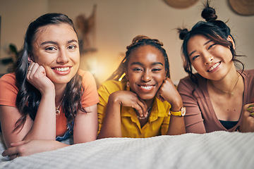 Image showing Portrait of women, friends on bed with smile and bonding in apartment together in support, trust and solidarity. Relax, love and friendship, girls in bedroom with diversity, pride and people in home.