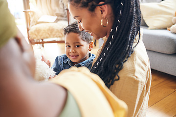 Image showing Family, lesbian mother and son in the living room of their home together for love or bonding closeup. Smile, happy and gay or lgbt woman bonding with her boy child in a house to relax on the weekend