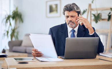 Image showing Document, laptop and businessman on a phone call in the office while talking to a client. Discussion, technology and mature professional male lawyer on mobile conversation with paperwork and computer