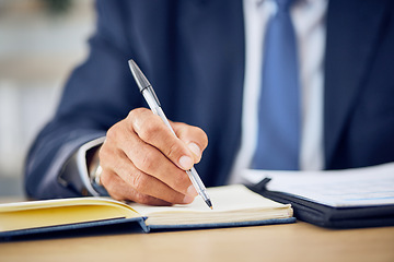 Image showing Hand, pen and writing in a notebook with a manager at a desk in his office closeup to schedule an appointment. Planning, management and journal with a business man in the corporate workplace