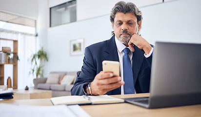 Image showing Networking, laptop and a business man with a phone for research, information technology or contact. Professional person with a smartphone and thinking of planning, reading email or communication