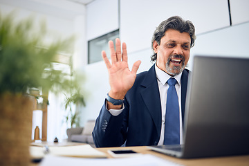 Image showing Discussion, video call and businessman with a laptop in the office for a team management webinar. Greeting, professional and mature male manager in a virtual meeting with a computer in the workplace.