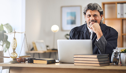 Image showing Justice, man and portrait in office with laptop for working in law firm, court research or search online for legal policy or rules. Judge, attorney or mature businessman in communication on computer