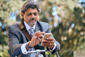 Image showing Bike travel, nature and a businessman with a phone for an email, reading communication and chat. Relax, commute and a mature employee with a bicycle and a mobile for a notification in the morning