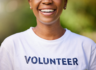 Image showing Woman, smile and happy volunteering in park or nature for climate change, earth day or environment. Mouth of person in community service, green NGO or nonprofit tshirt for outdoor support and helping