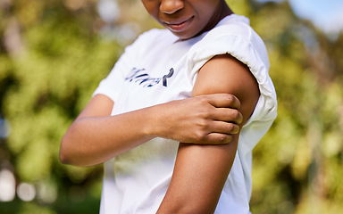 Image showing Woman, arm injury and pain in nature from accident, tension or outdoor muscle cramp. Closeup of female person or volunteer worker with sore ache, discomfort or joint inflammation in nature