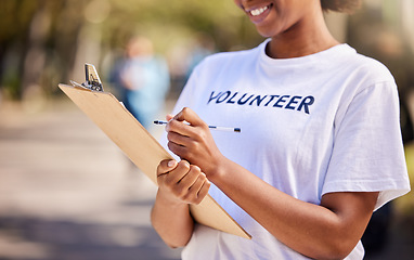 Image showing Woman, checklist and volunteering in park for climate change, outdoor inspection or community service. Happy person writing on clipboard for earth day, NGO registration or nonprofit sign up in nature