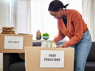 Image showing Food, donation and volunteer with black woman and box for charity, helping and support. Grocery, community service and hope with person at home for ngo package, nonprofit and social responsibility