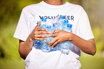 Image showing Volunteer hands, plastic bottle and park for community service, recycling and climate change or earth day project. Person volunteering outdoor or nature for eco friendly cleaning or nonprofit support